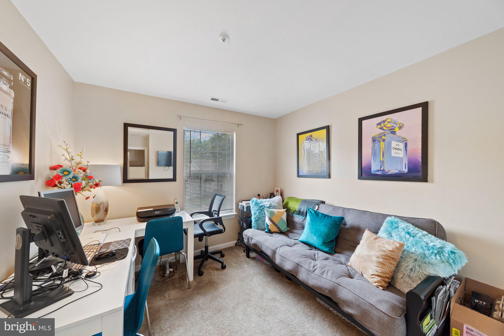 3535 Corn Stream Road Randallstown, MD 21133 - Photo 14 of 25 a living room with furniture and a window