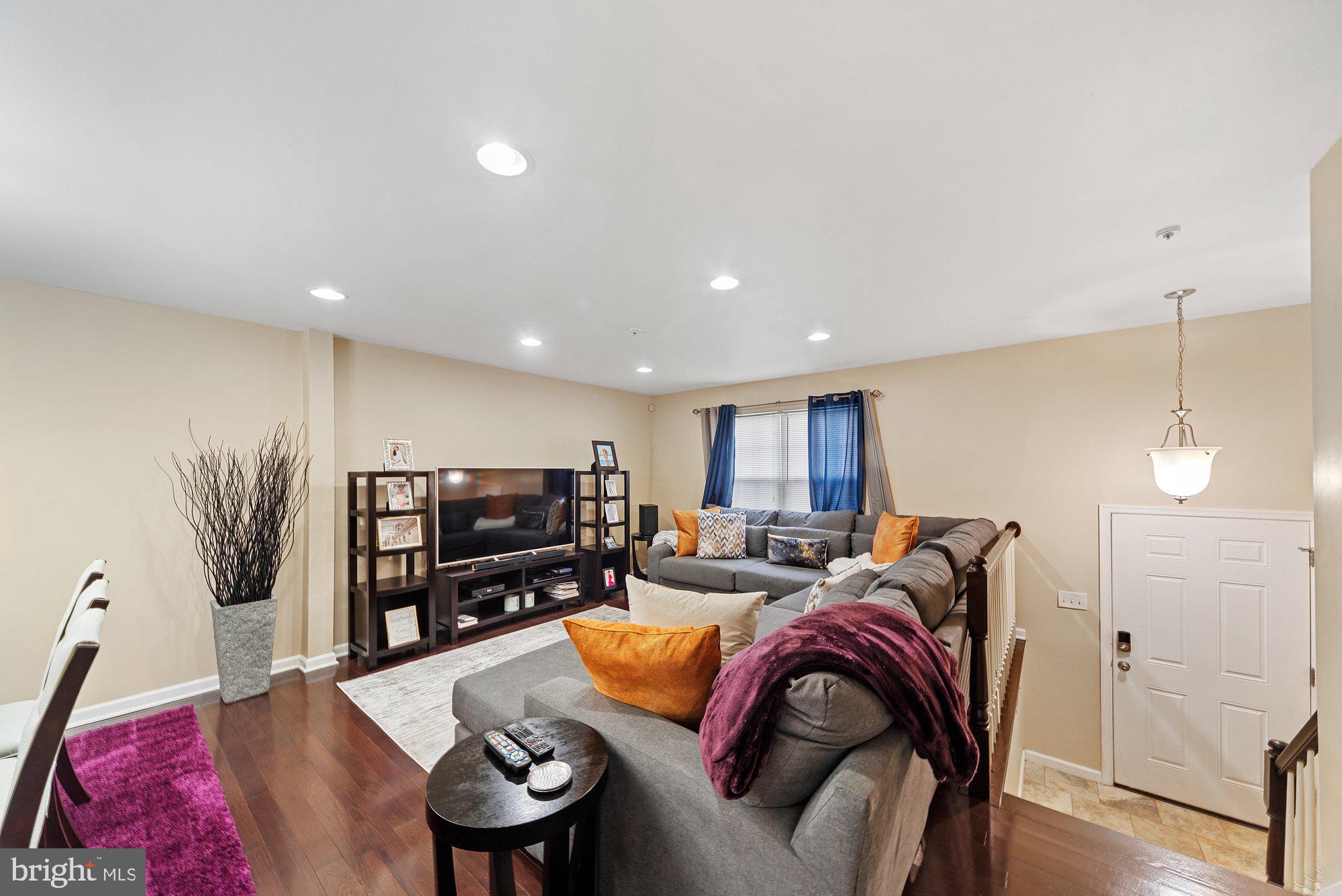 3535 Corn Stream Road Randallstown, MD 21133 - Photo 3 of 25 a living room with furniture and a flat screen tv