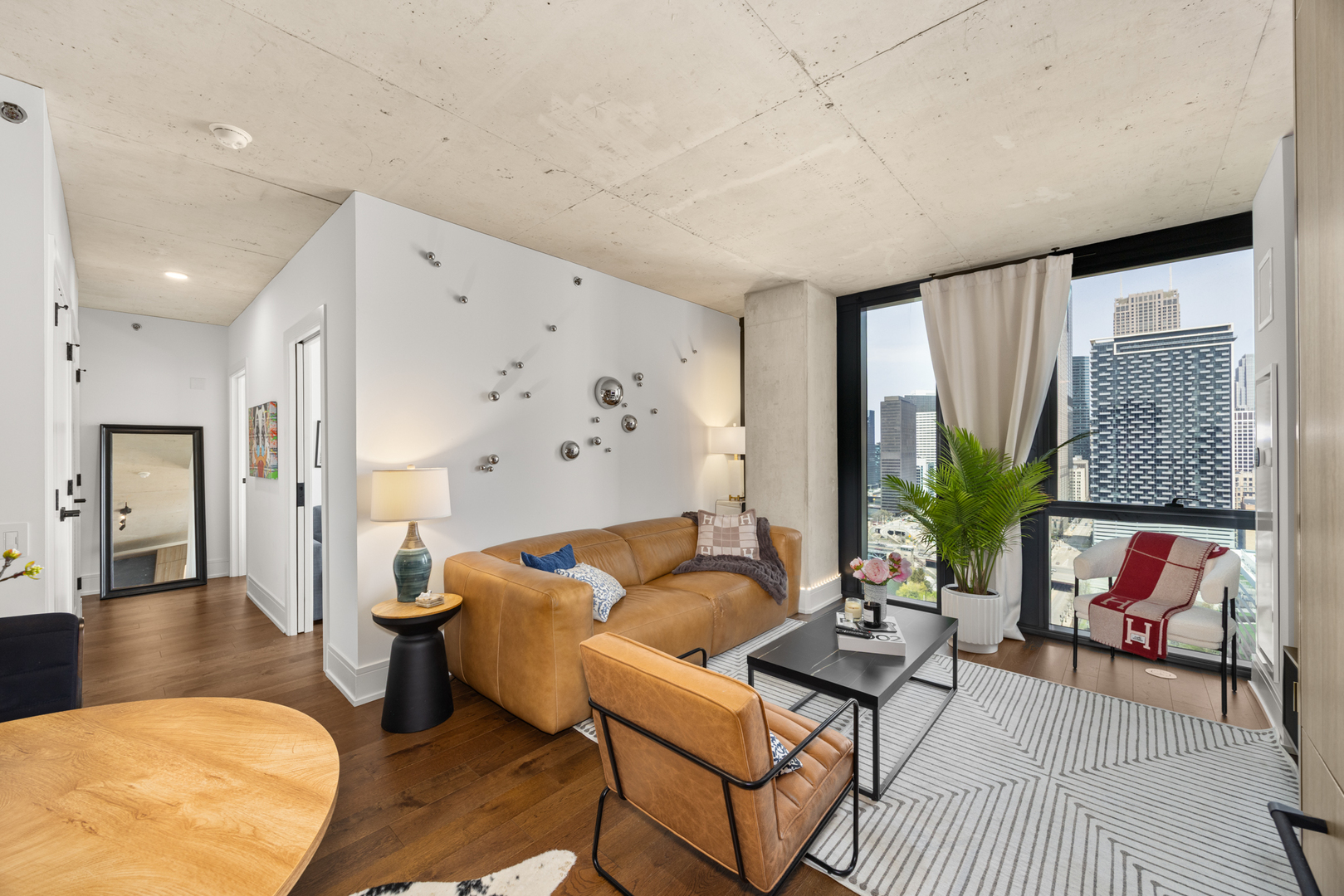 Undisclosed Address Chicago, IL 60607 - Photo 19 of 44 a living room with furniture and a large window