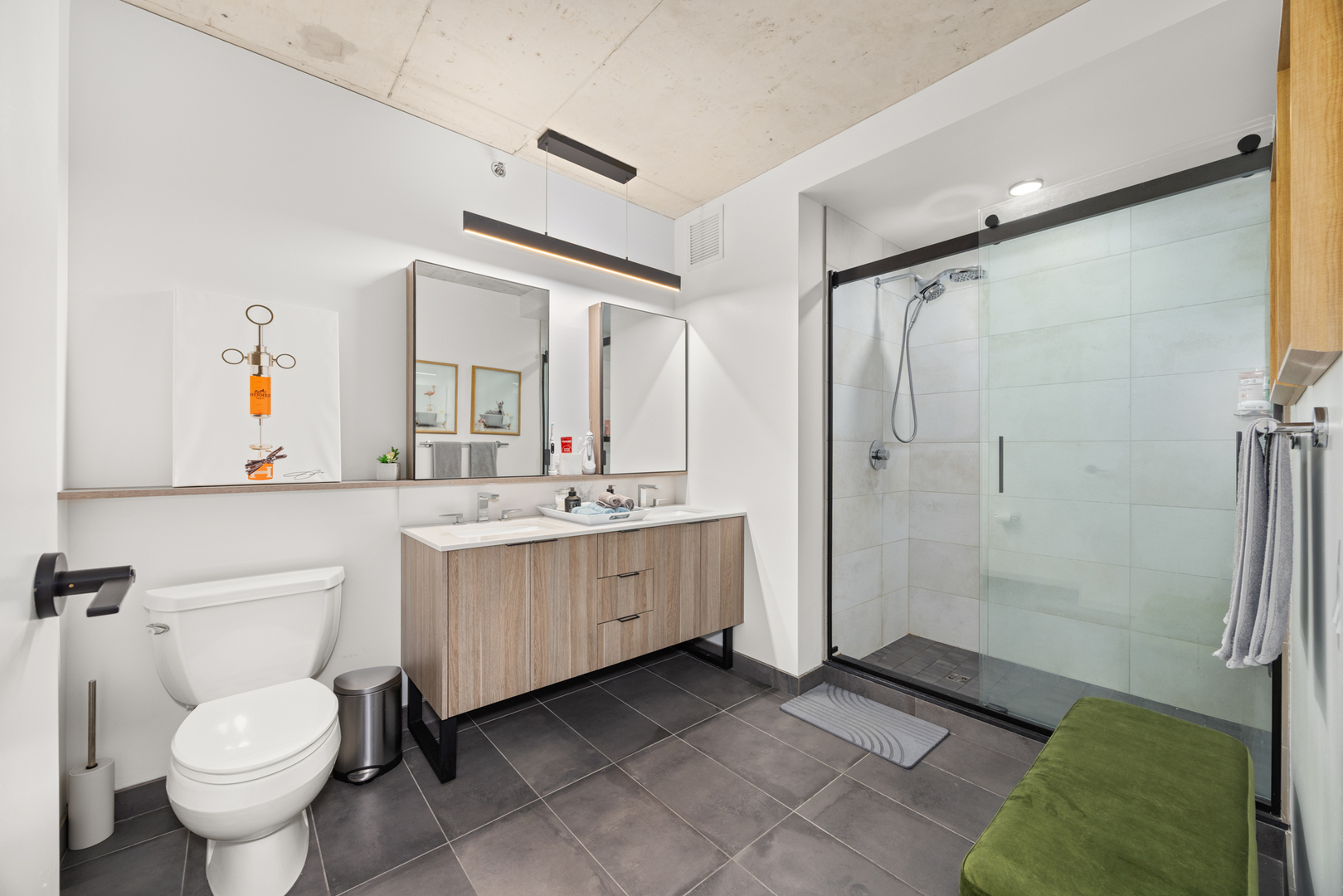 Undisclosed Address Chicago, IL 60607 - Photo 25 of 44 a bathroom with a sink mirror vanity and toilet