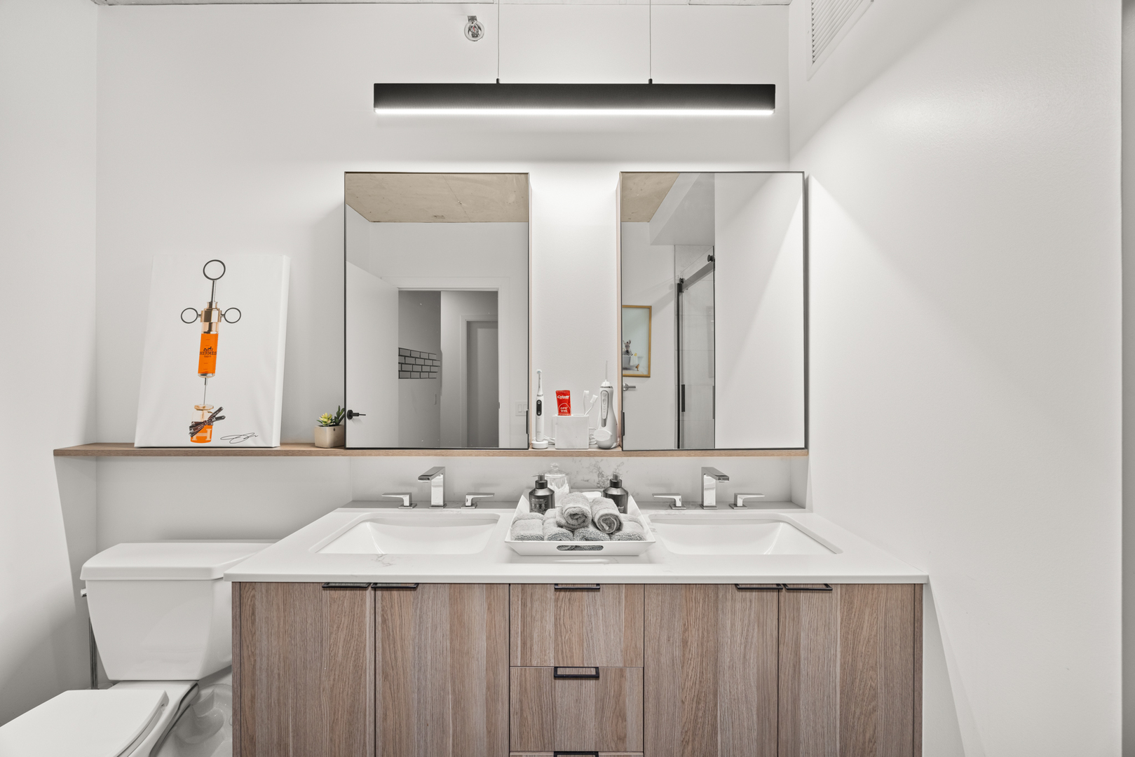 Undisclosed Address Chicago, IL 60607 - Photo 26 of 44 a bathroom with a sink and a mirror