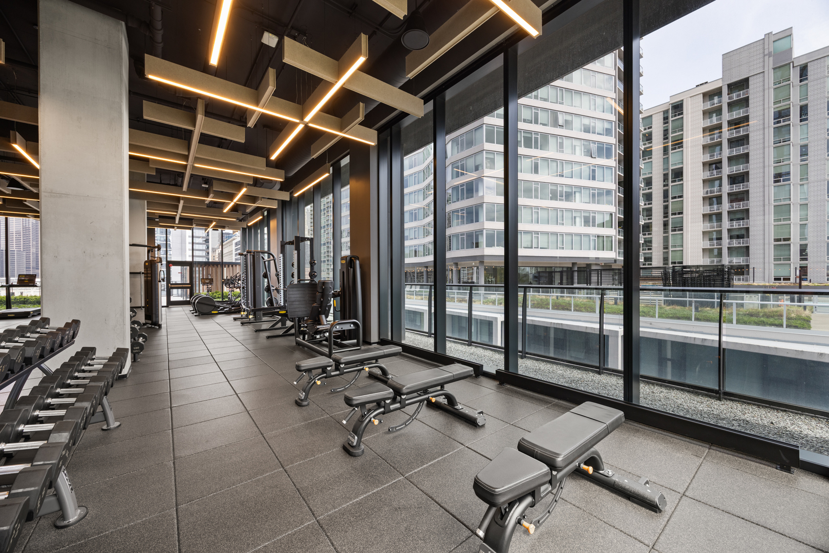 Undisclosed Address Chicago, IL 60607 - Photo 32 of 44 a room with gym equipment