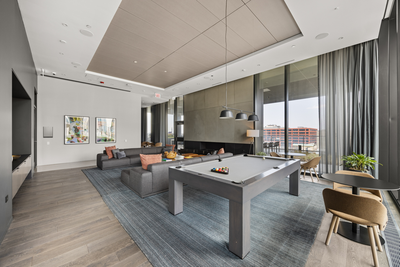 Undisclosed Address Chicago, IL 60607 - Photo 36 of 44 a living room with furniture a large window and wooden floor