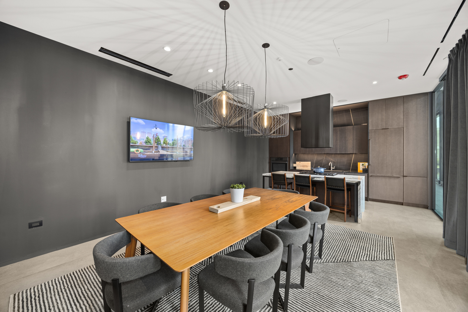 Undisclosed Address Chicago, IL 60607 - Photo 41 of 44 a kitchen with stainless steel appliances kitchen island granite countertop a sink a stove a refrigerator a stove a dining table and chairs