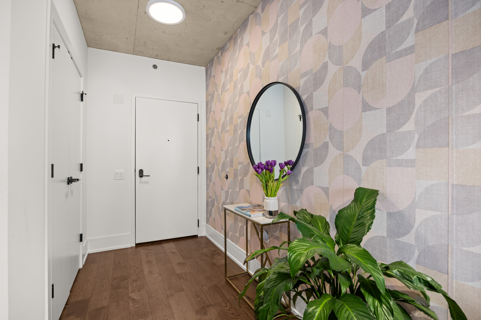 Undisclosed Address Chicago, IL 60607 - Photo 9 of 44 a front view of a house with garden and staircase