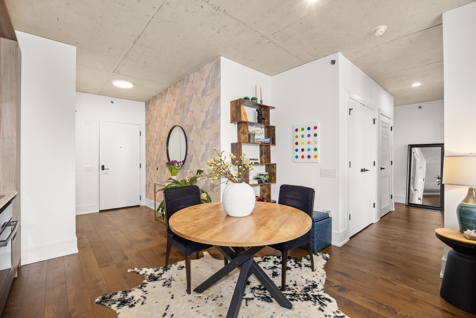 Undisclosed Address Chicago, IL 60607 - Photo 10 of 44 a view of a dining room with furniture and wooden floor