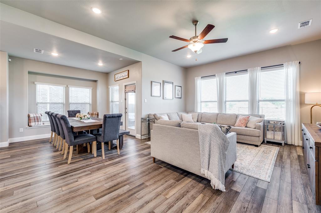 2113 Graham Road Anna, TX 75409 - Photo 18 of 38 a living room with furniture and a wooden floor