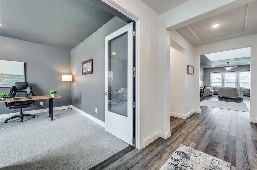 2113 Graham Road Anna, TX 75409 - Photo 2 of 38 a living room with furniture and a table
