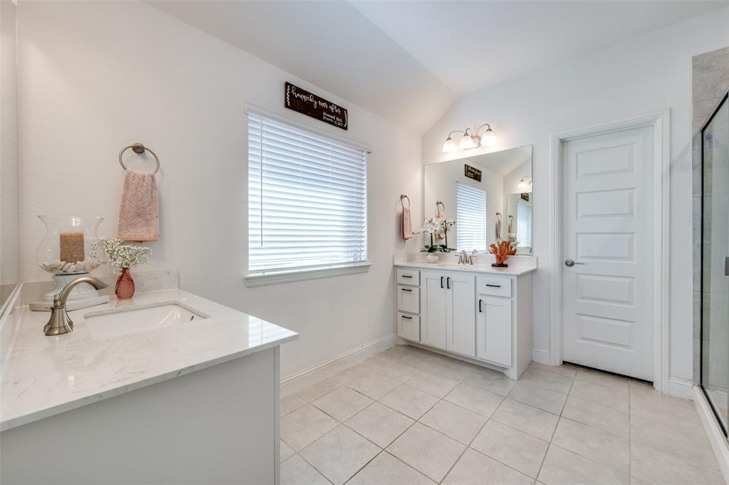 2113 Graham Road Anna, TX 75409 - Photo 24 of 38 a bathroom with a sink vanity and mirror