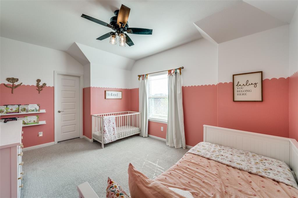 2113 Graham Road Anna, TX 75409 - Photo 30 of 38 a bedroom with a bed and a dresser