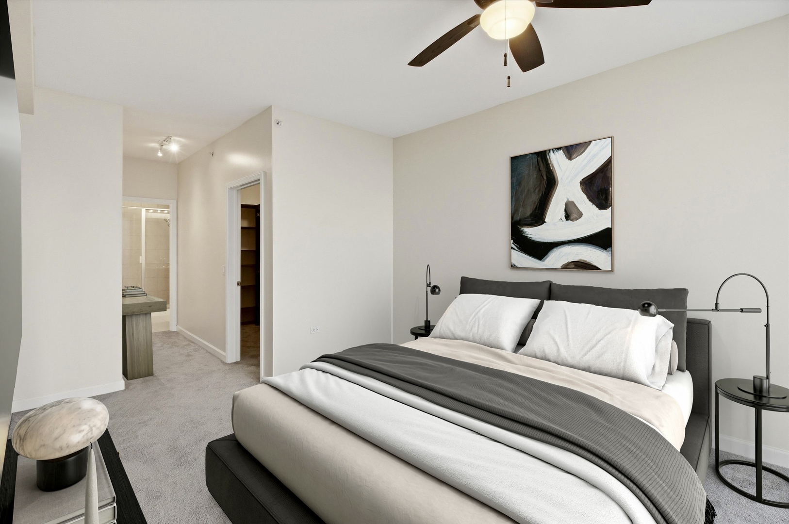 100 East 14th Street, Unit 1204 Chicago, IL 60605 - Photo 14 of 28 a bedroom with a bed and lamp