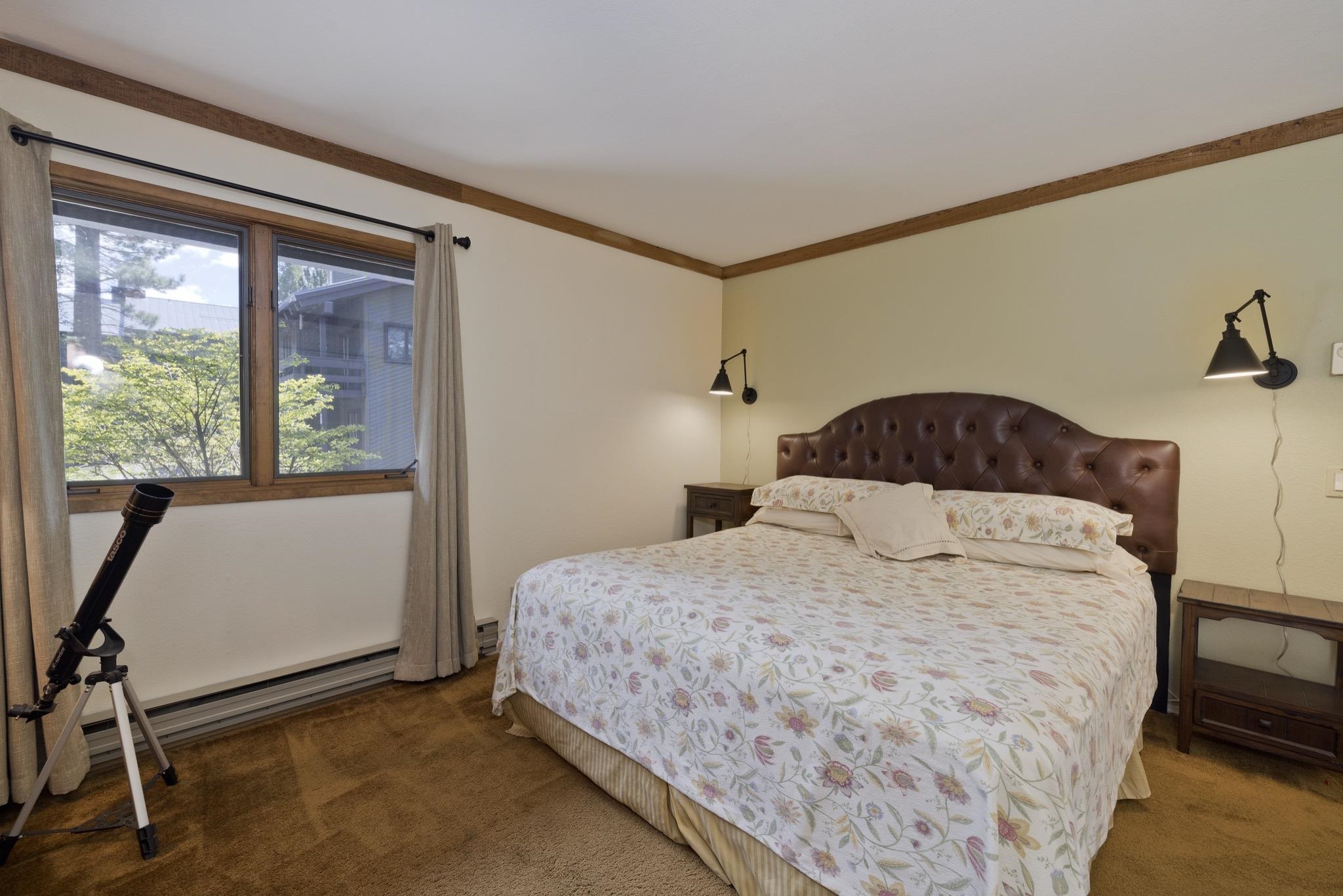 484 Manzanita Road, Unit 16 Mammoth Lakes, CA 93546 - Photo 25 of 34 a bedroom with a bed and a window