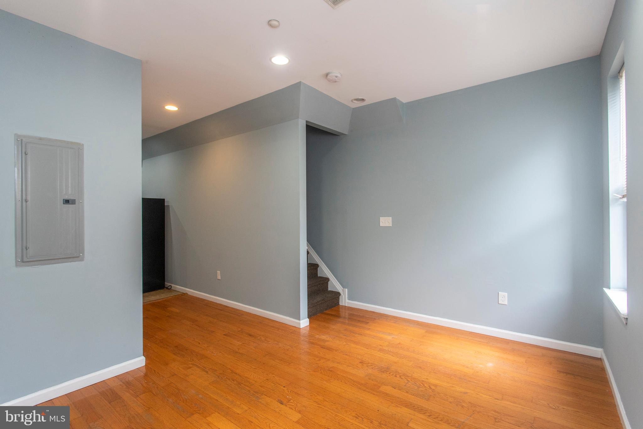 2016 North 18th Street, Unit 2 Philadelphia, PA 19121 - Photo 14 of 23 a view of an empty room with wooden floor