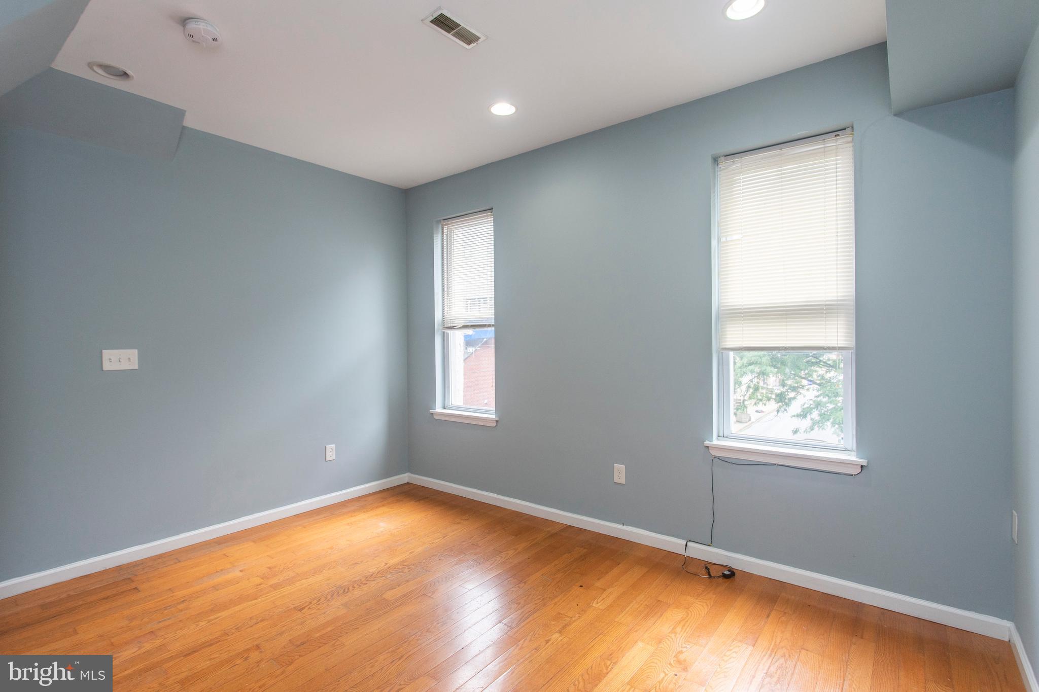 2016 North 18th Street, Unit 2 Philadelphia, PA 19121 - Photo 15 of 23 a view of an empty room with a window