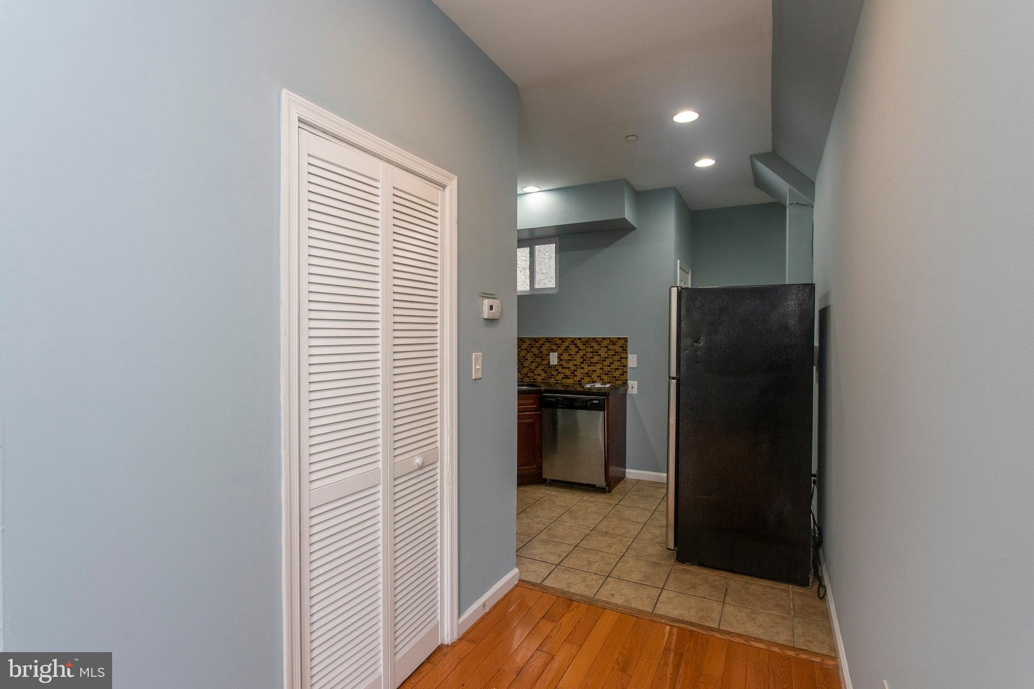 2016 North 18th Street, Unit 2 Philadelphia, PA 19121 - Photo 16 of 23 a view of a kitchen from the hallway