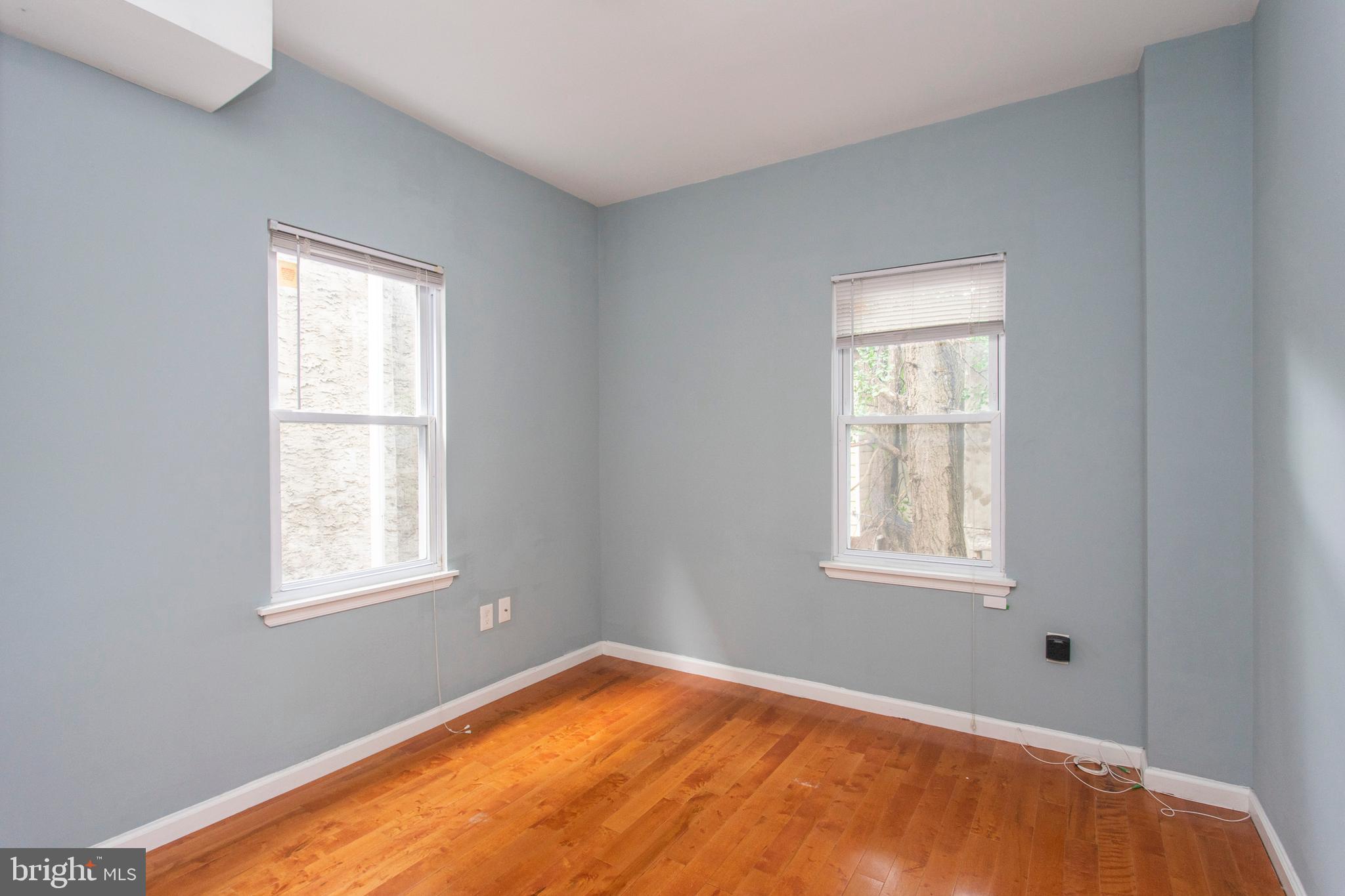 2016 North 18th Street, Unit 2 Philadelphia, PA 19121 - Photo 21 of 23 a view of a bedroom with window