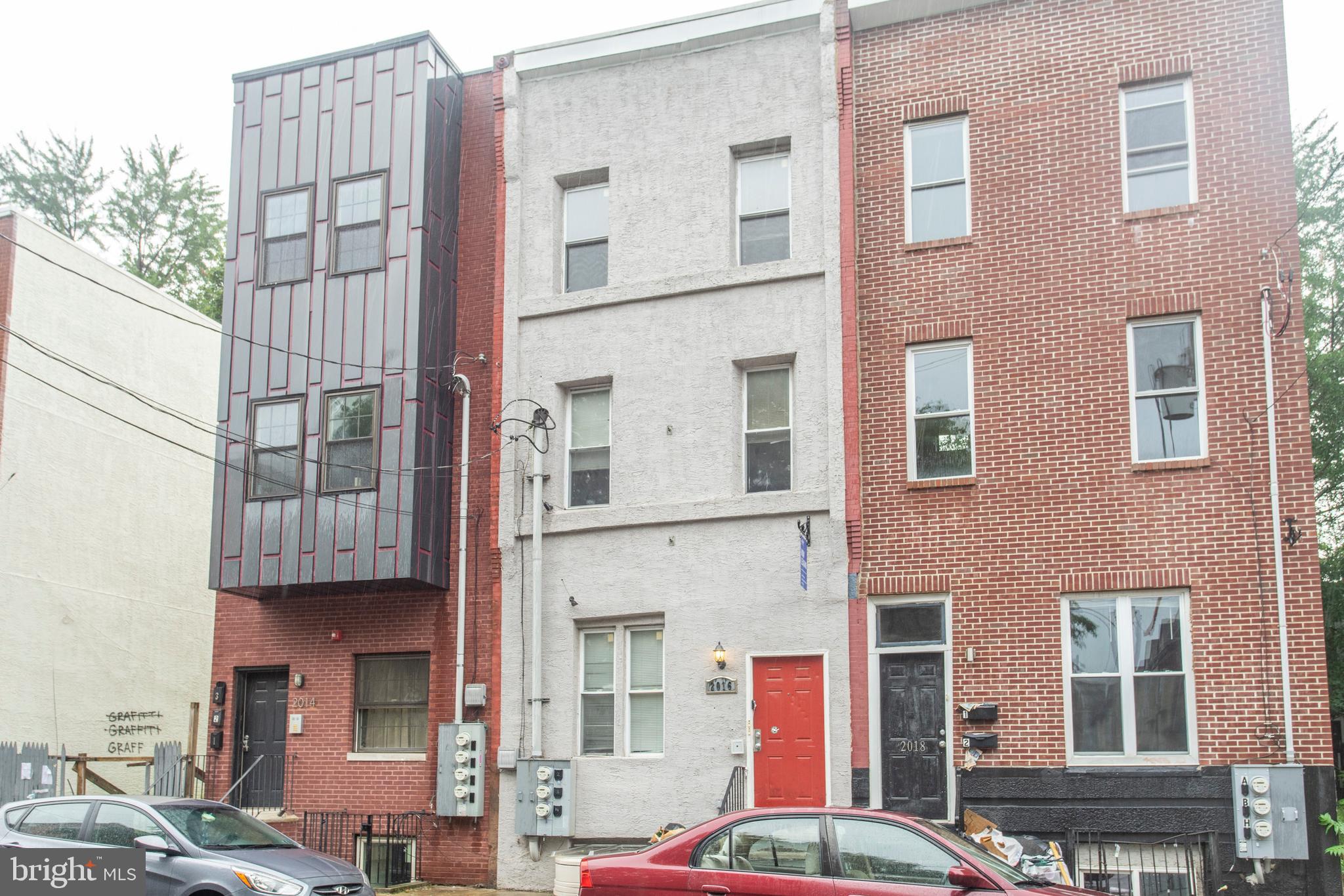 2016 North 18th Street, Unit 2 Philadelphia, PA 19121 - Photo 3 of 23 a front view of a multi story building