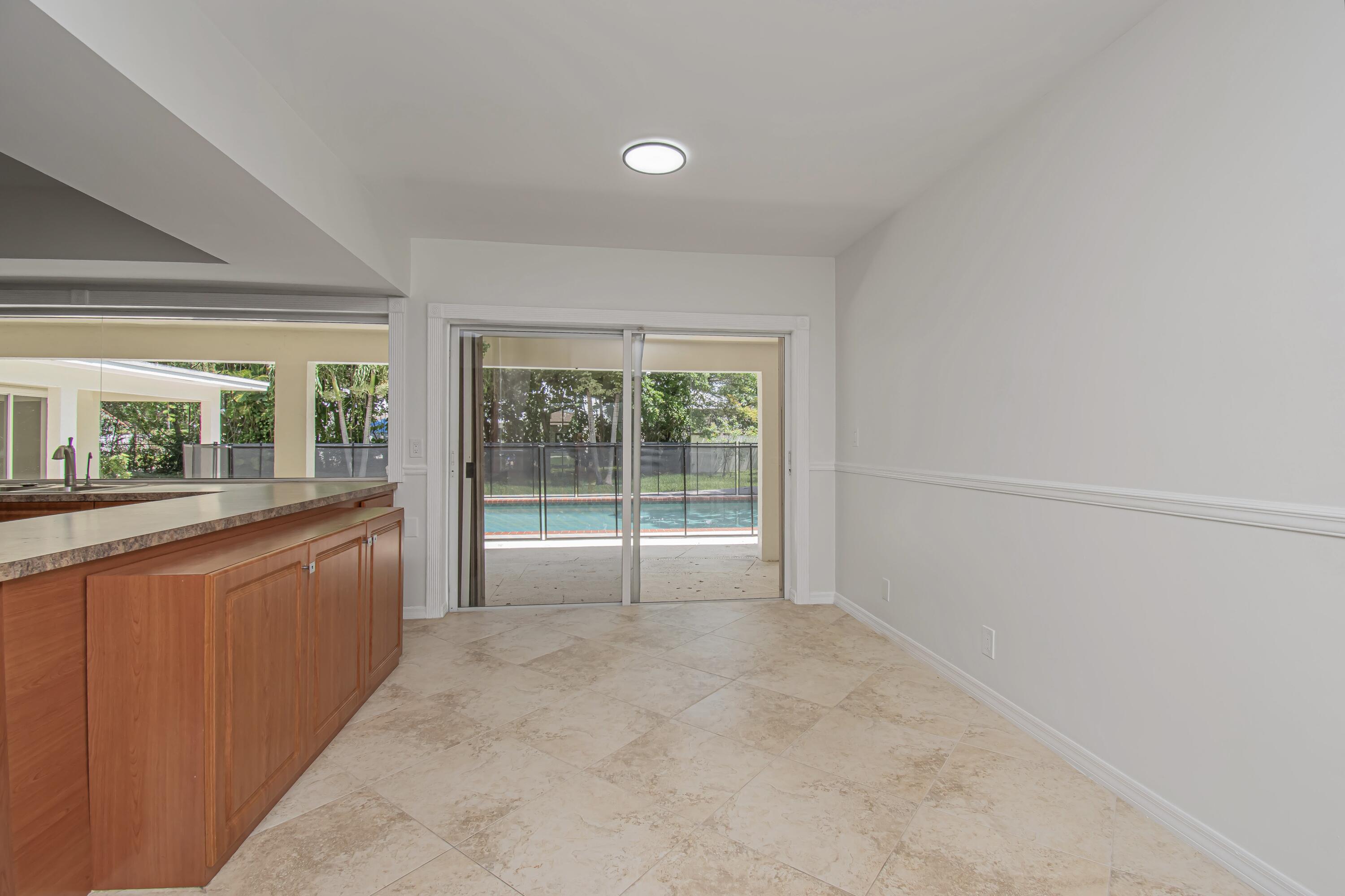 6749 South Grande Drive Boca Raton, FL 33433 - Photo 16 of 35 a room with window