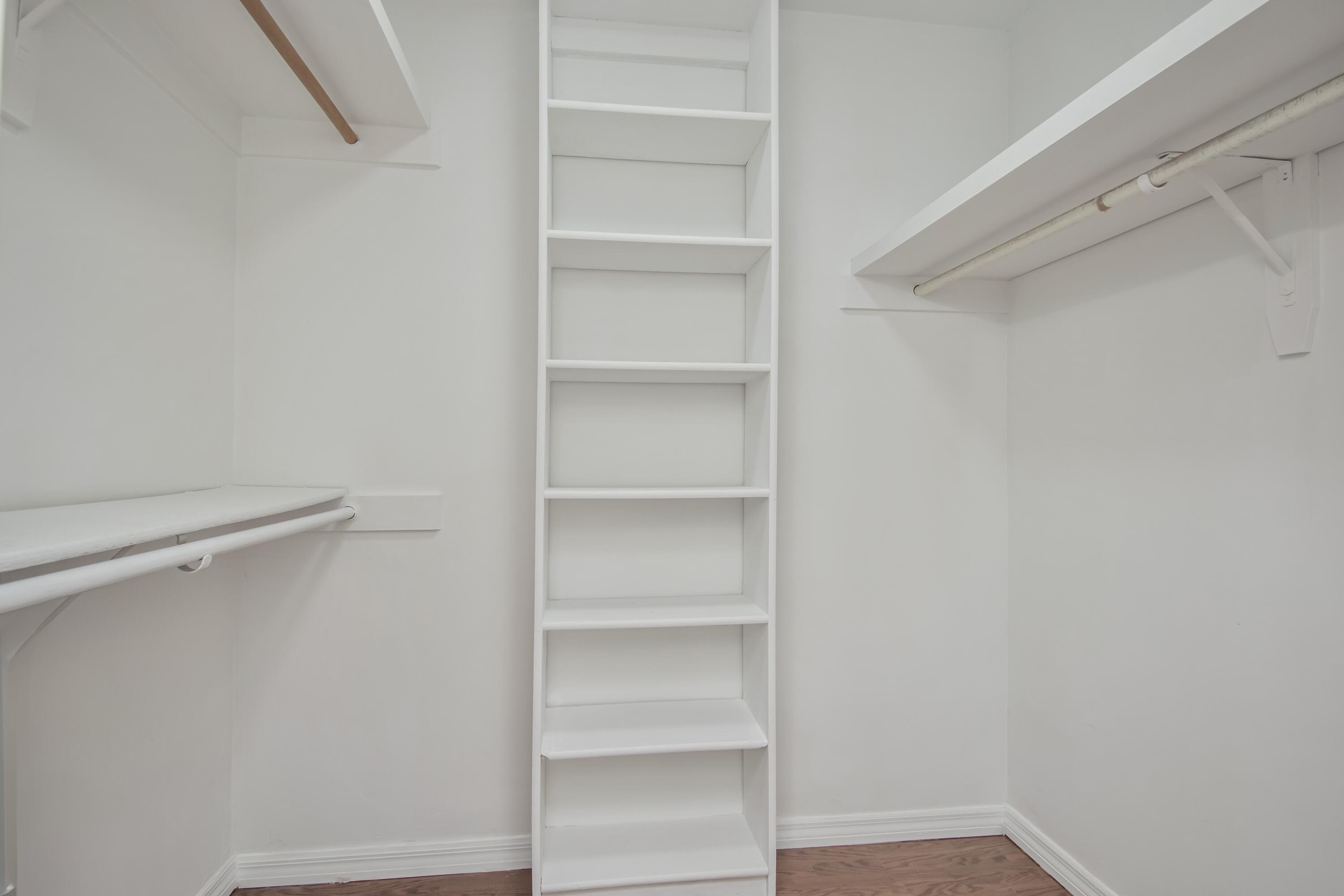 6749 South Grande Drive Boca Raton, FL 33433 - Photo 28 of 35 a view of walk in closet with empty racks