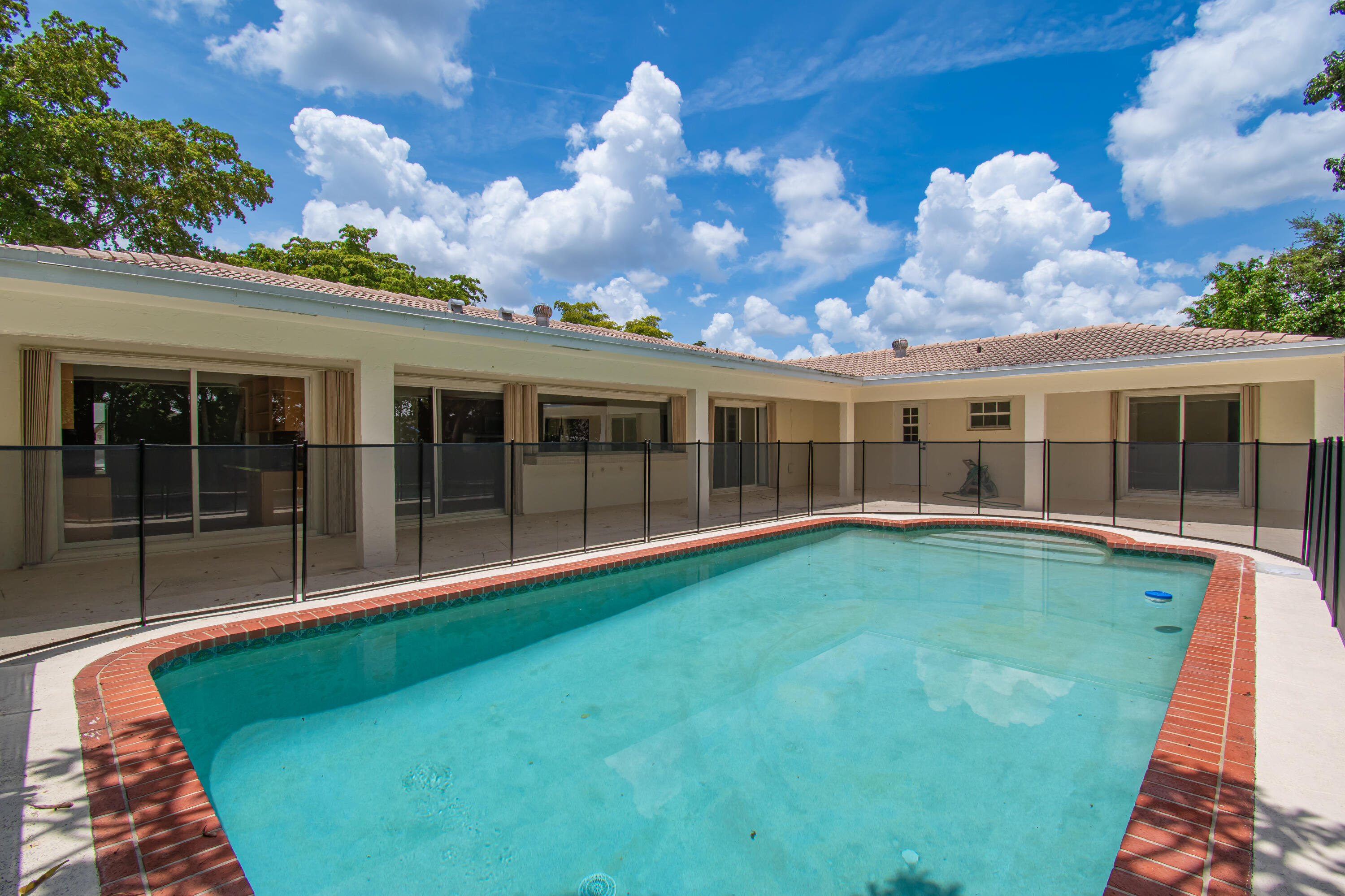 6749 South Grande Drive Boca Raton, FL 33433 - Photo 31 of 35 a view of an house with backyard space and balcony