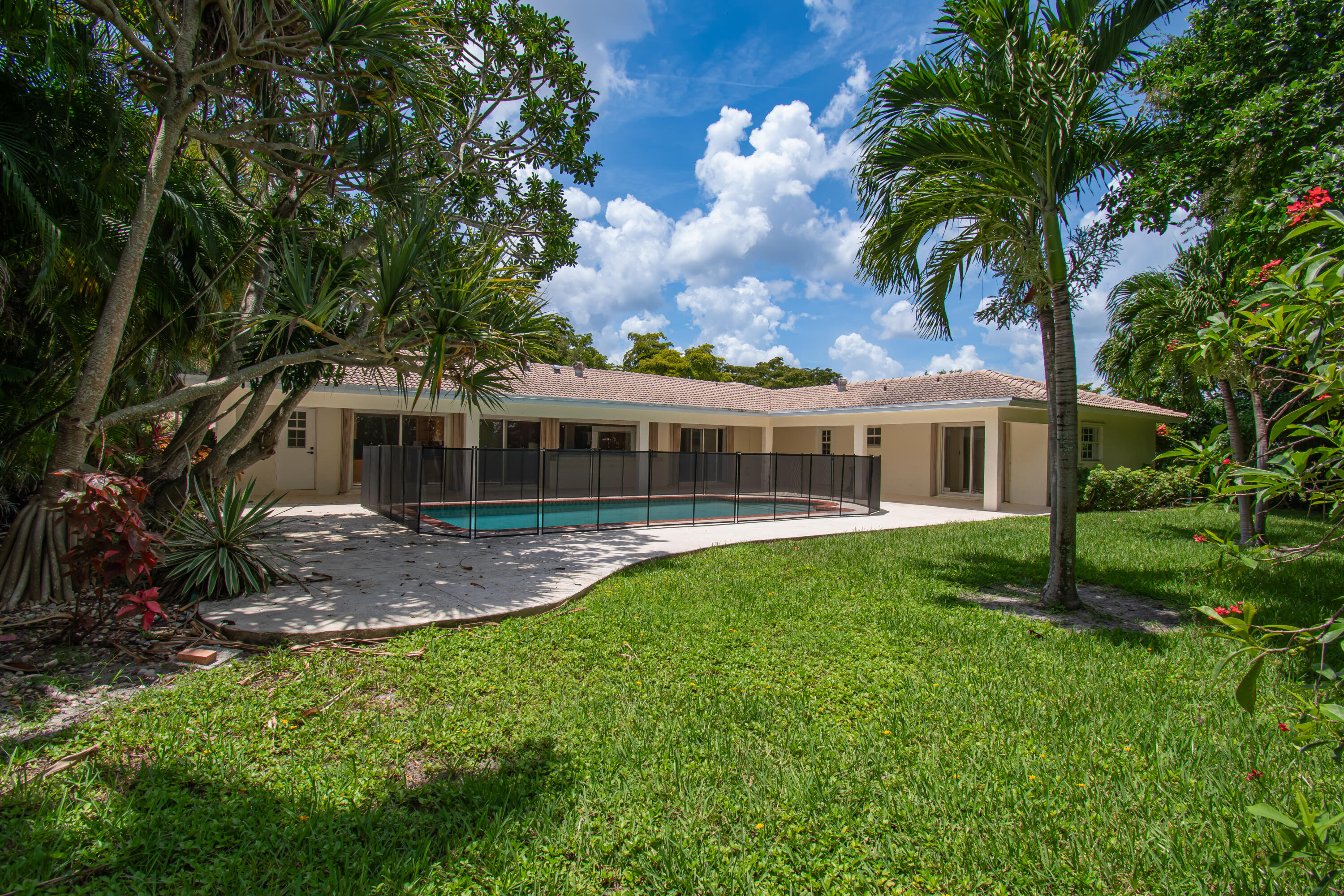 6749 South Grande Drive Boca Raton, FL 33433 - Photo 33 of 35 a front view of house with yard and green space