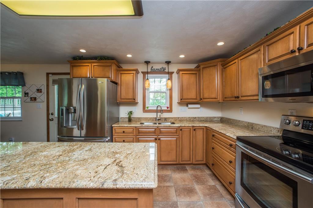 3270 Oaknoll Road Gibsonia, PA 15044 - Photo 4 of 23 Kitchen cabinets are custom made with granite counter top and center island