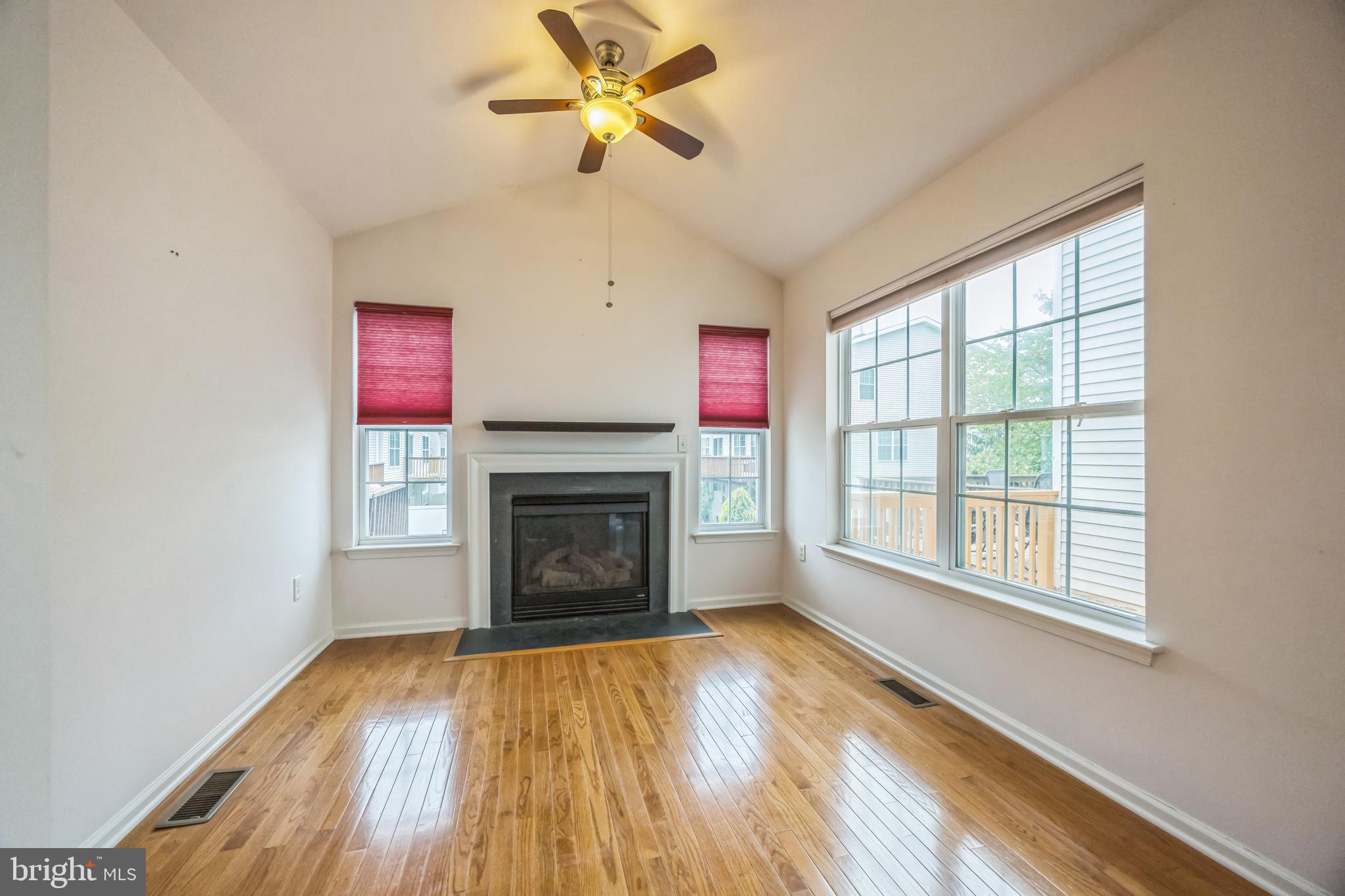 504 Nottingham Place Riverside, NJ 08075 - Photo 13 of 30 a view of empty room with wooden floor and fan