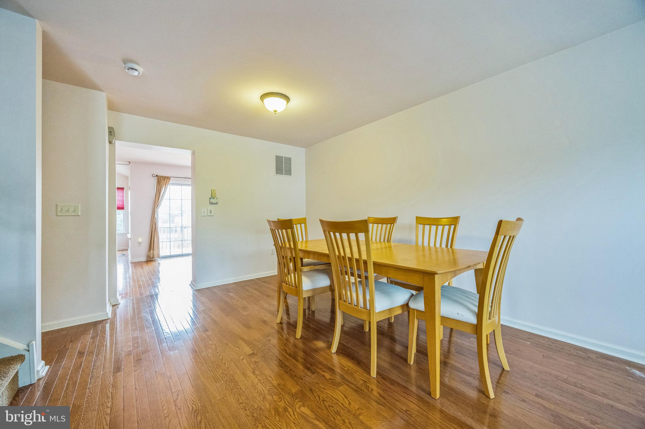 504 Nottingham Place Riverside, NJ 08075 - Photo 23 of 30 a view of a dining room with furniture and wooden floor