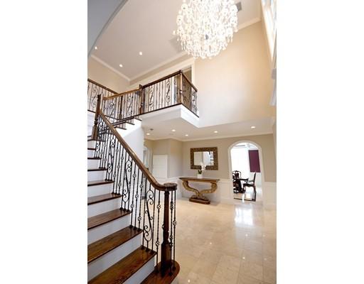 26 Clifton Road Newton, MA 02459 - Photo 3 of 30 a view of entryway and hall with a front door