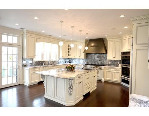 26 Clifton Road Newton, MA 02459 - Photo 5 of 30 a kitchen with a stove top oven and refrigerator