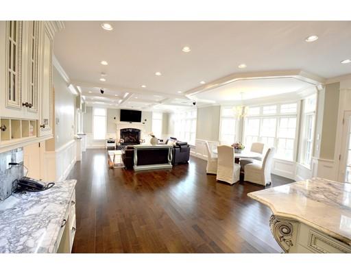 26 Clifton Road Newton, MA 02459 - Photo 7 of 30 a living room with furniture and a flat screen tv