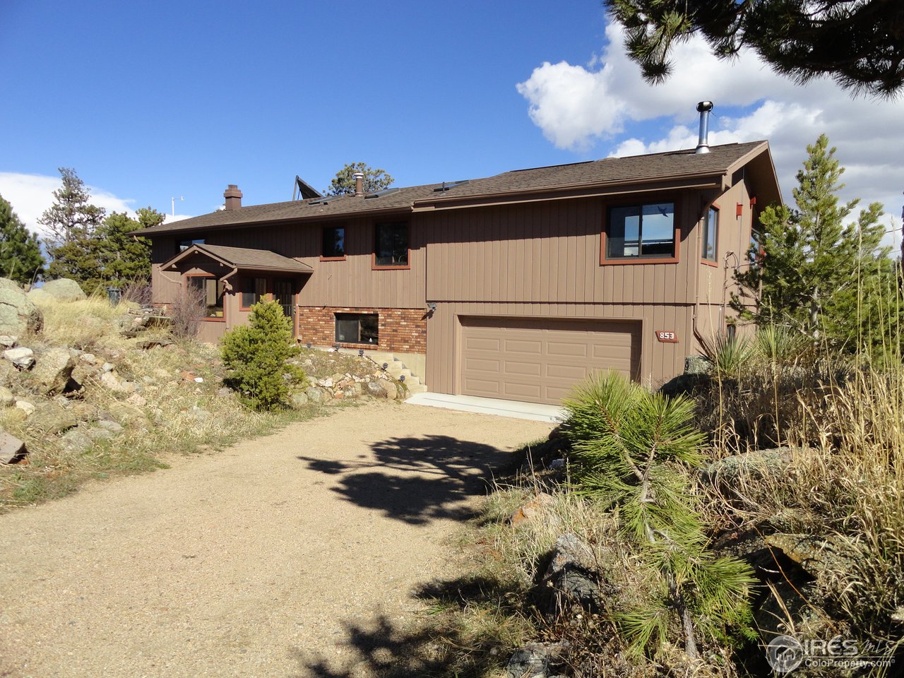 853 Deer Trail Road Boulder, CO 80302 - Photo 1 of 22 a view of a back yard of the house