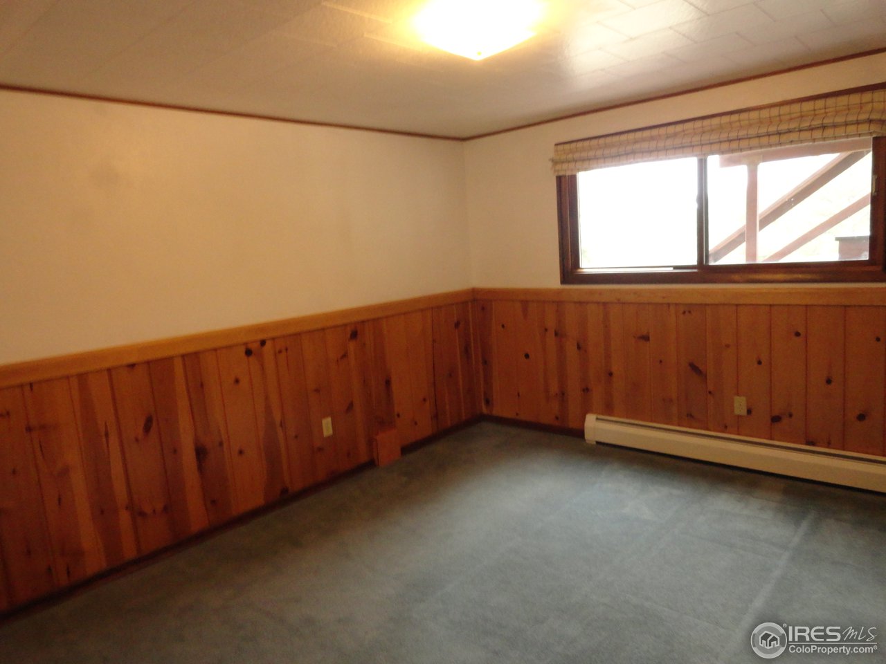 853 Deer Trail Road Boulder, CO 80302 - Photo 12 of 22 a view of an empty room with a window