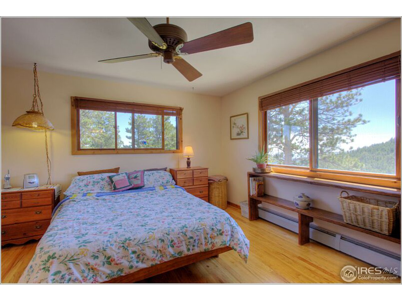 853 Deer Trail Road Boulder, CO 80302 - Photo 5 of 22 a bedroom with a bed and window