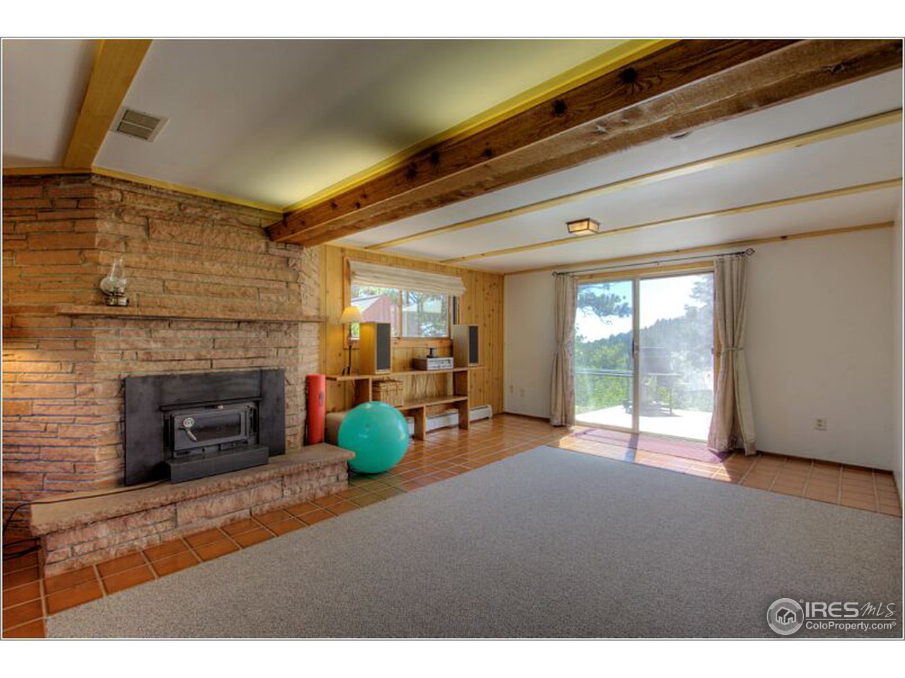 853 Deer Trail Road Boulder, CO 80302 - Photo 6 of 22 a view of a livingroom with a fireplace and window
