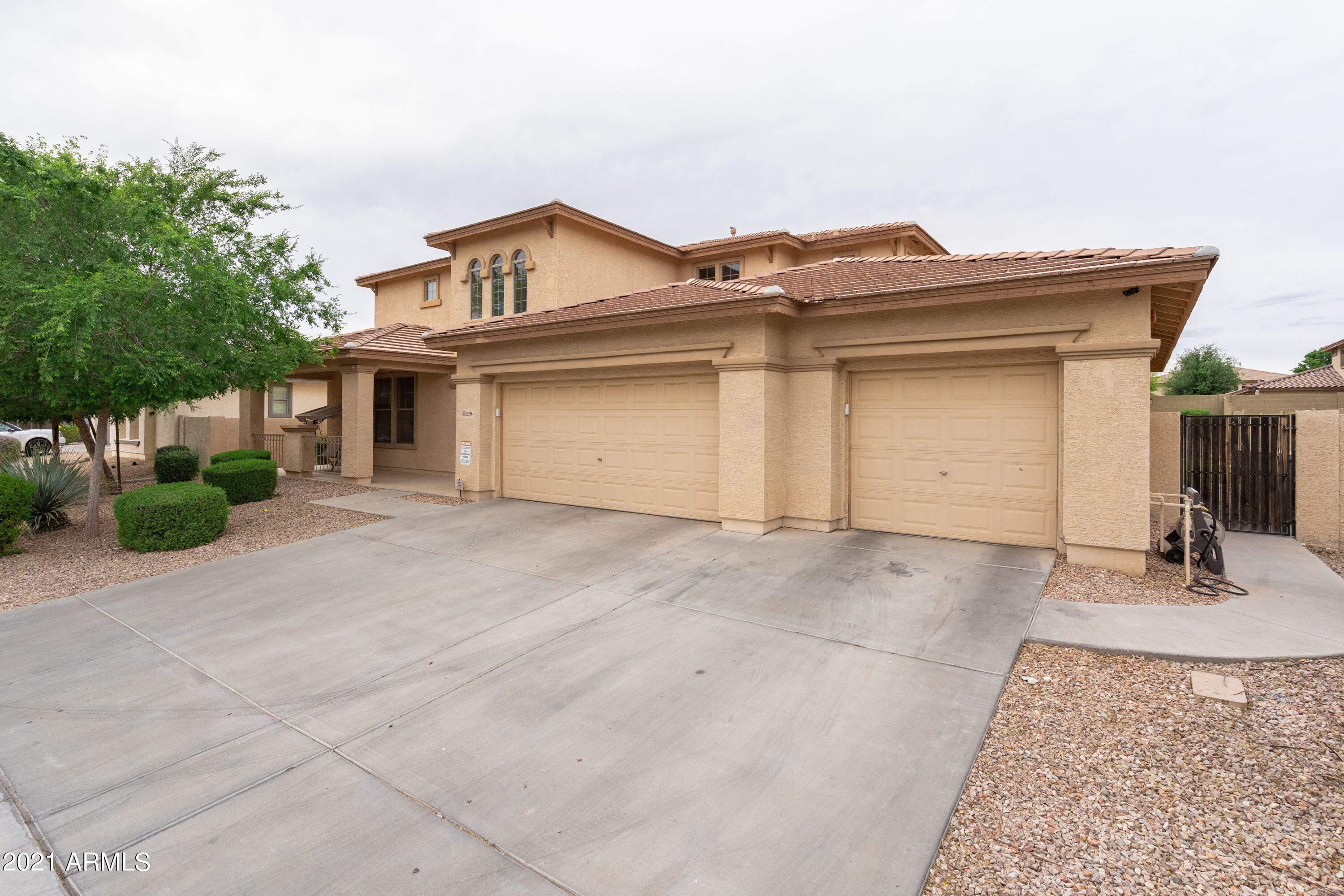 15296 West Coolidge Street Goodyear, AZ 85395 - Photo 16 of 23 15296 W Coolidge-4-Car Garage Entry