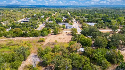 a view of a bunch of trees and houses