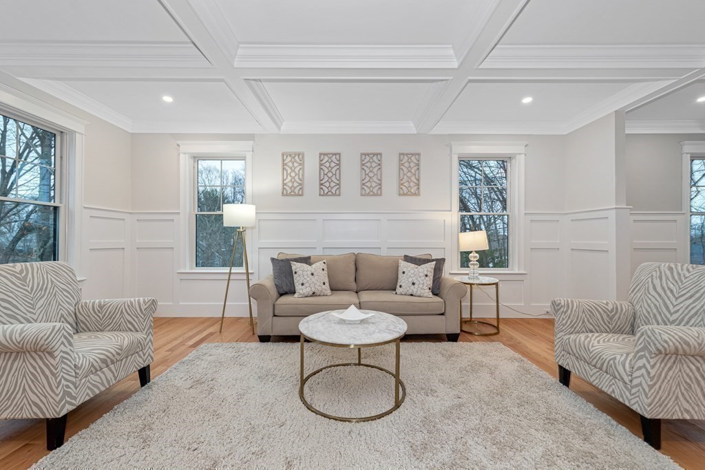 3 Crawford Road Lexington, MA 02420 - Photo 11 of 42 a living room with furniture and a potted plant
