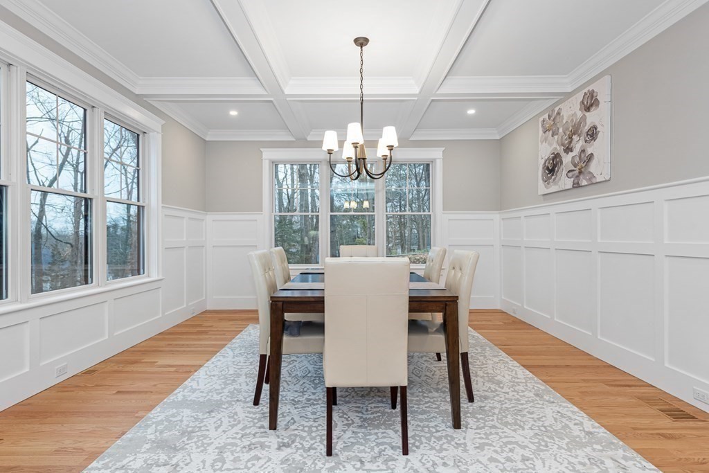 3 Crawford Road Lexington, MA 02420 - Photo 13 of 42 a view of a dining room with furniture wooden floor and chandelier
