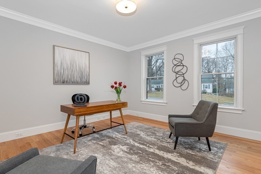 3 Crawford Road Lexington, MA 02420 - Photo 14 of 42 a living room with furniture and a window