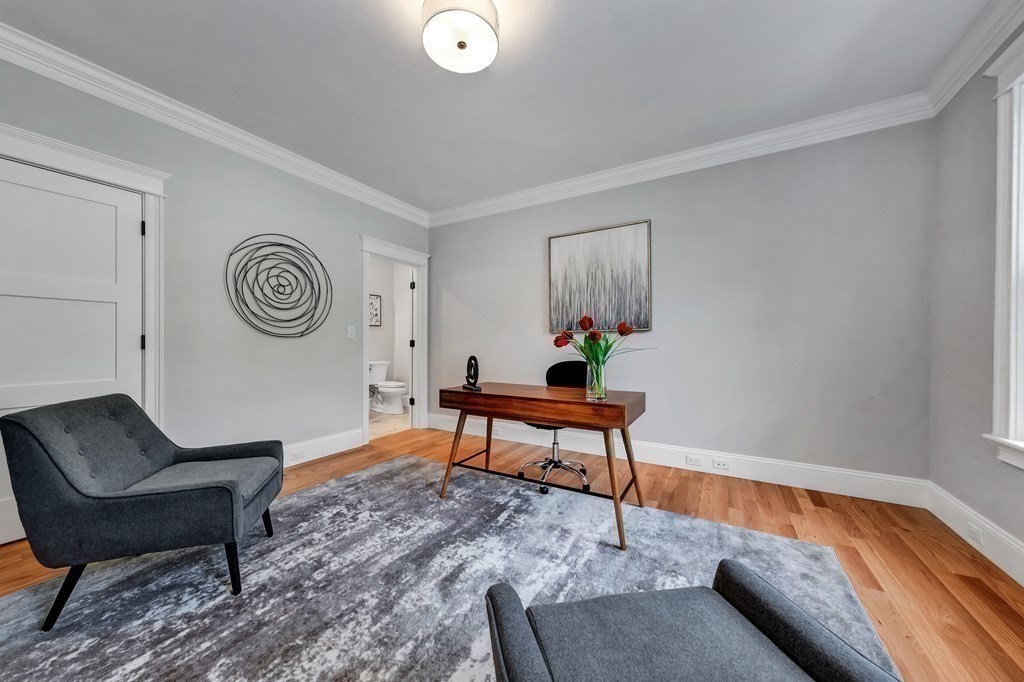 3 Crawford Road Lexington, MA 02420 - Photo 15 of 42 a living room with furniture and wooden floor