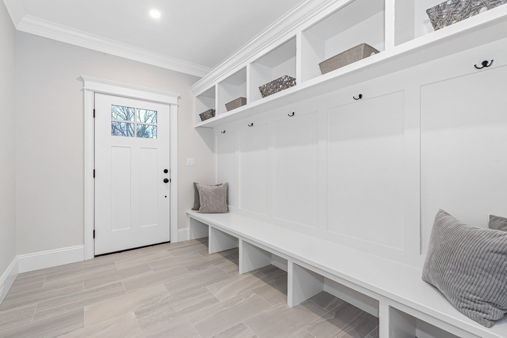 3 Crawford Road Lexington, MA 02420 - Photo 20 of 42 a view of room with stairs and windows