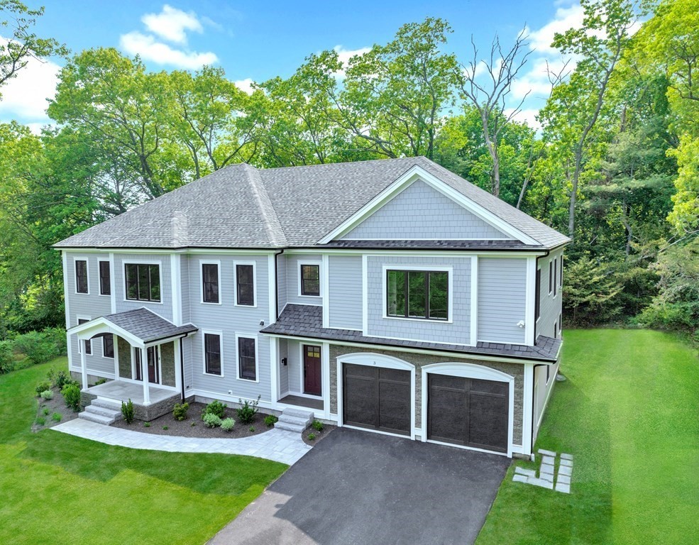 3 Crawford Road Lexington, MA 02420 - Photo 2 of 42 a white house with tall trees in the background