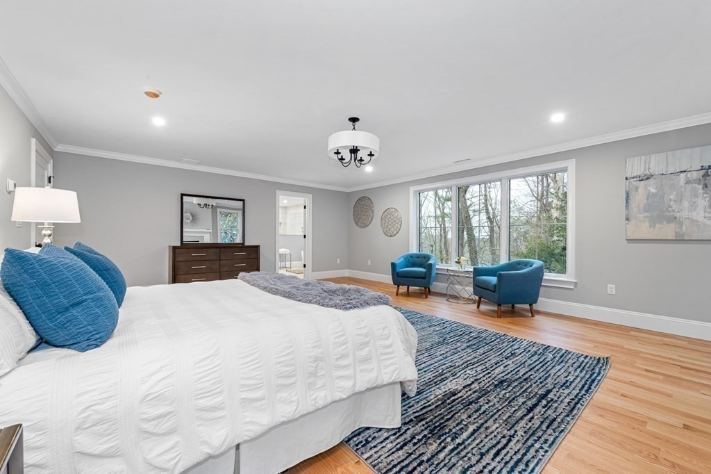 3 Crawford Road Lexington, MA 02420 - Photo 23 of 42 a bed room with a bed and a window