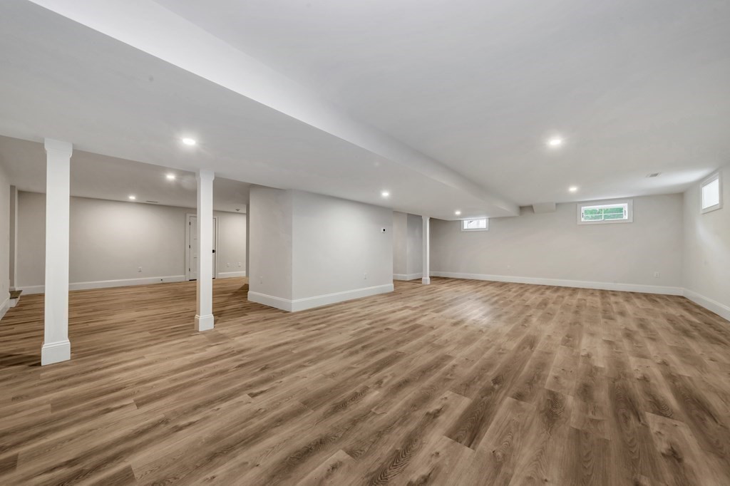 3 Crawford Road Lexington, MA 02420 - Photo 31 of 42 a view of an empty room with wooden floor