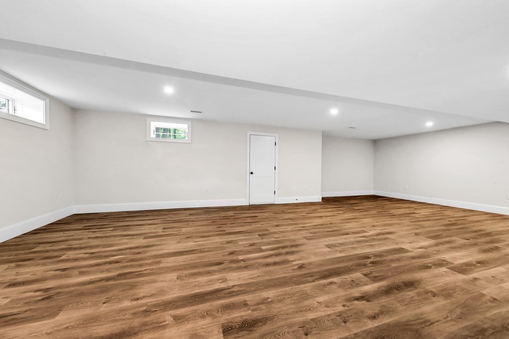 3 Crawford Road Lexington, MA 02420 - Photo 32 of 42 a view of empty room with wooden floor