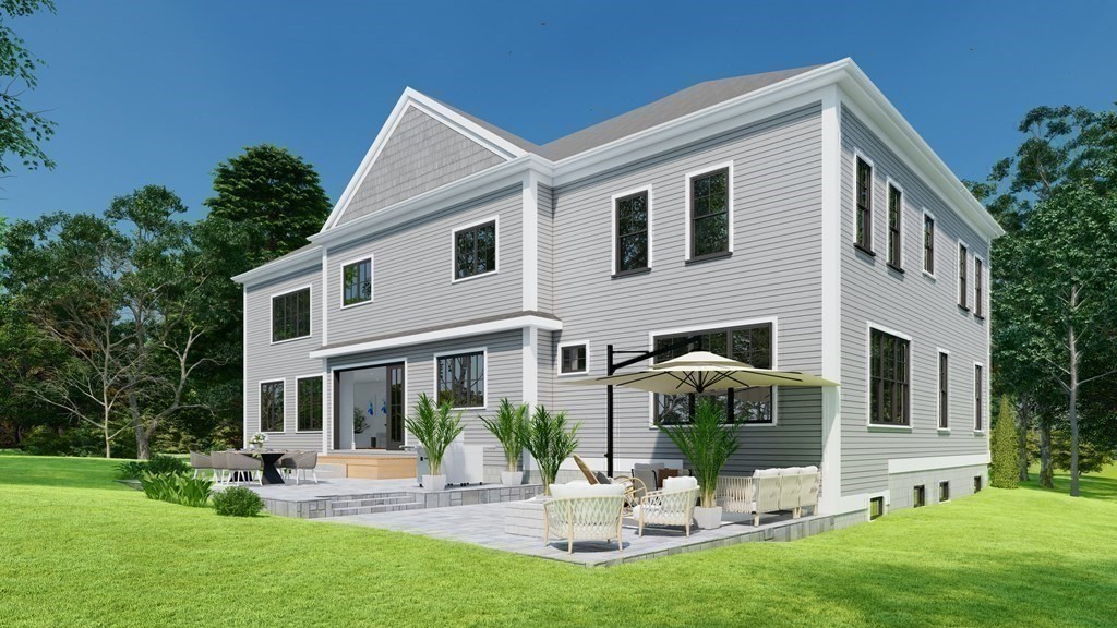 3 Crawford Road Lexington, MA 02420 - Photo 35 of 42 a front view of a house with garden and sitting area