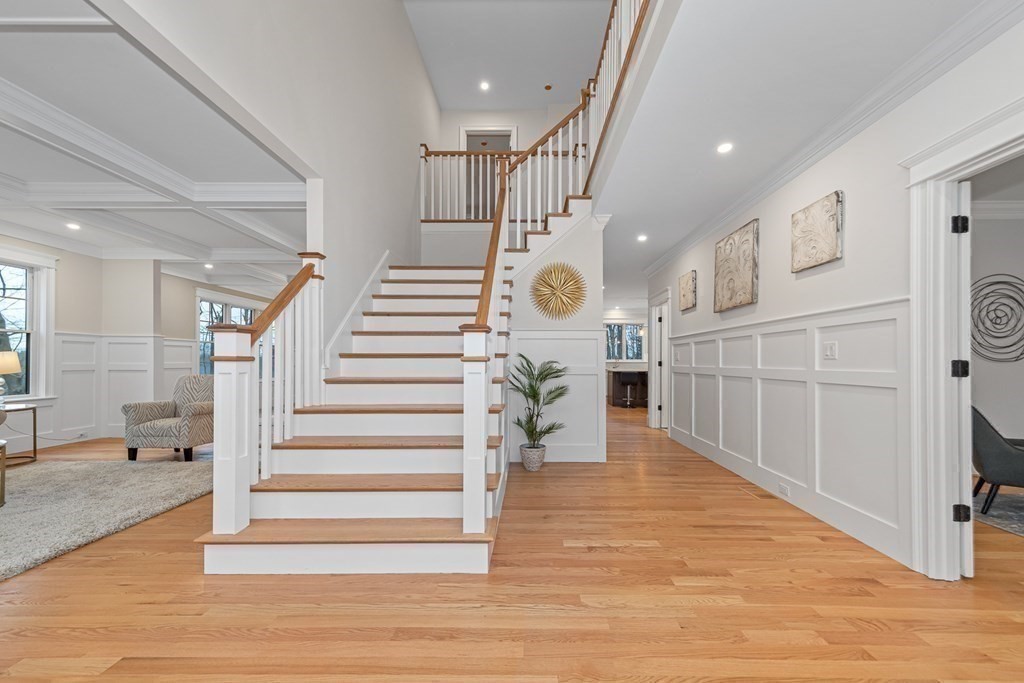 3 Crawford Road Lexington, MA 02420 - Photo 9 of 42 a view of entryway and hall with wooden floor