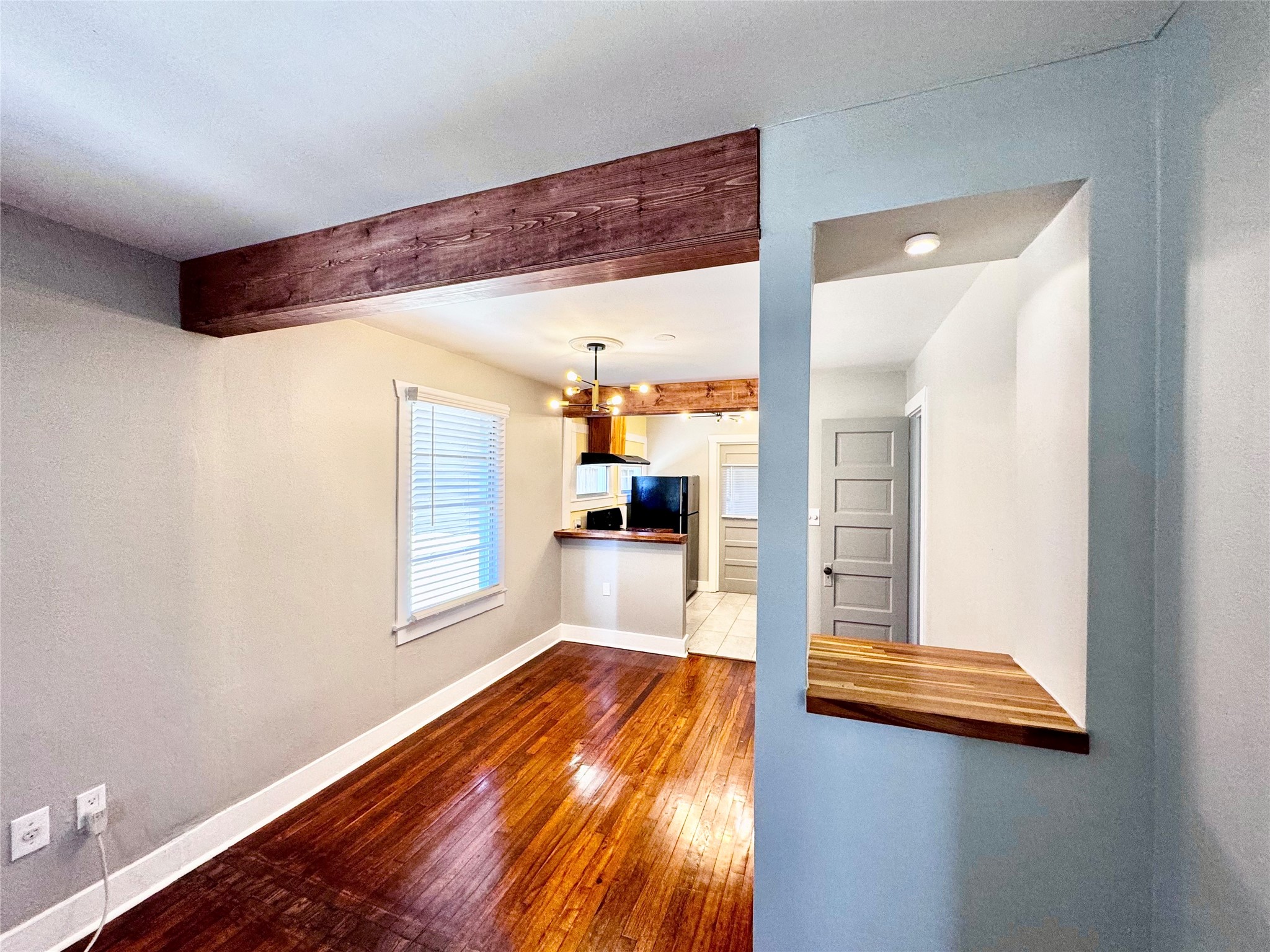 1018 Dunbar Street Houston, TX 77009 - Photo 10 of 30 Beautiful wood beams add oodles of charm! And check out this awesome art niche with a butcher-block shelf!