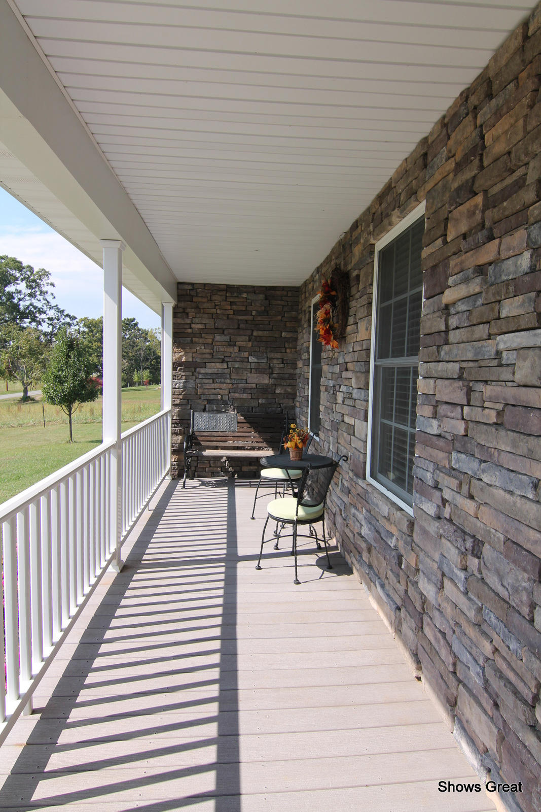 3734 Edwardsville Road Hardy, VA 24101 - Photo 3 of 47 a balcony with chairs and wooden floor